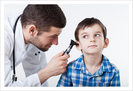 This is a doctor looking at a child ears.