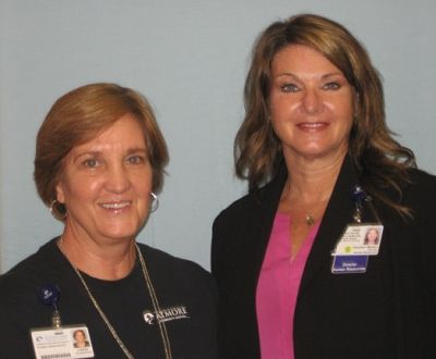 This is a picture of two of the HR staff at the Hospital